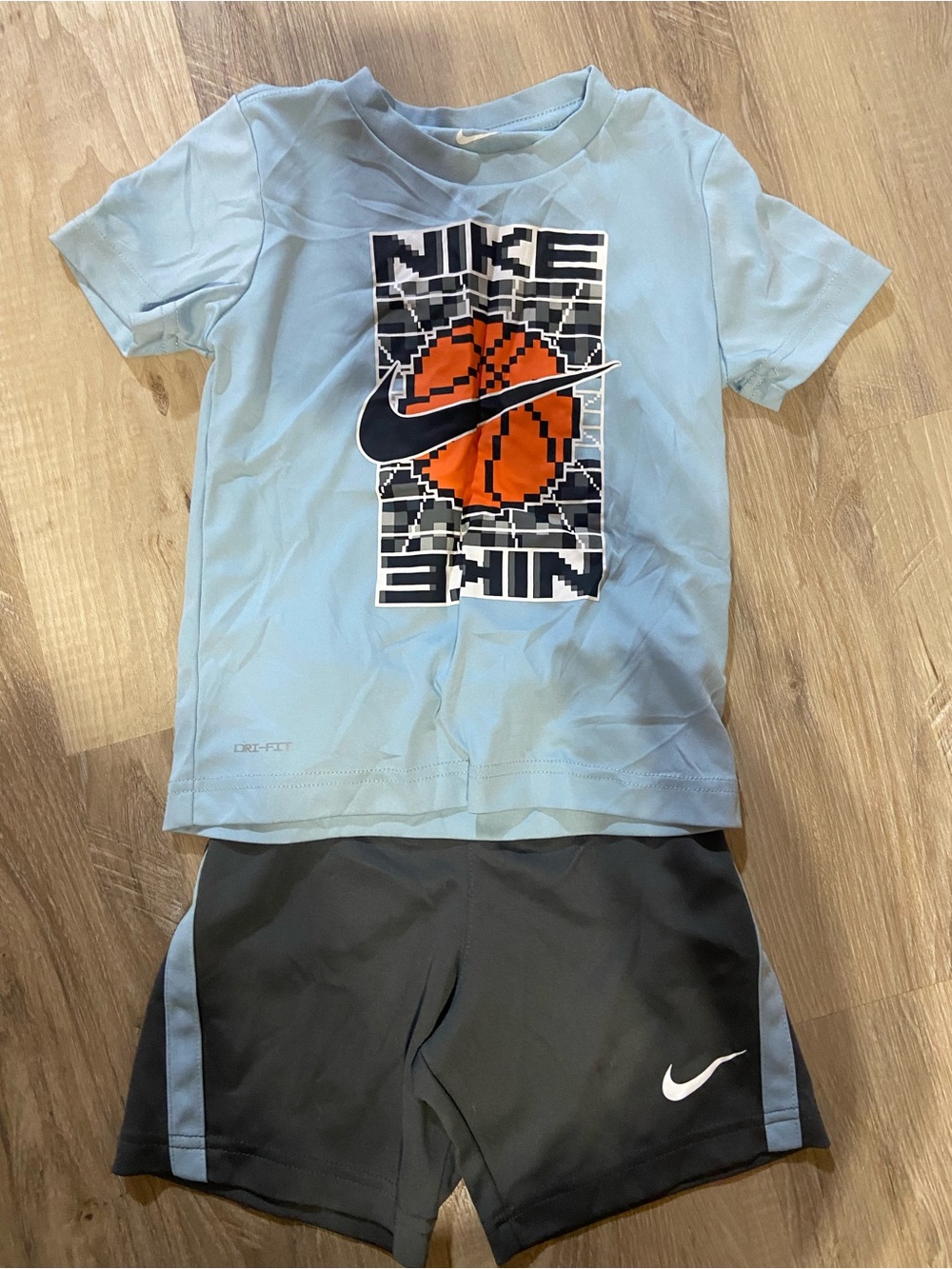 Nike Light Blue Short Sleeve Tee with Orange Basketball Graphic